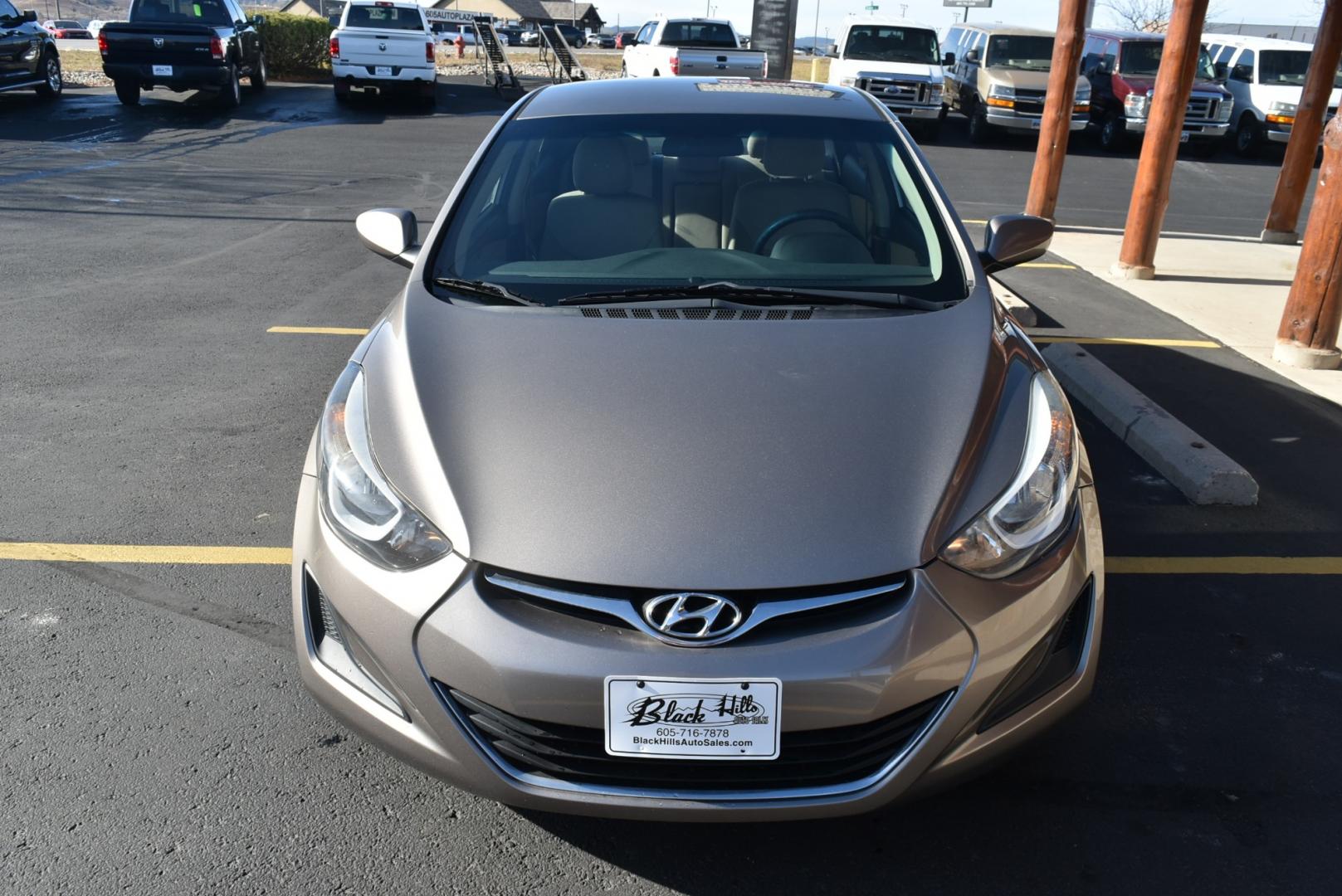 2016 Bronze Hyundai Elantra SE (5NPDH4AE3GH) with an 1.8L 4 Cyl engine, 6-Speed Automatic transmission, located at 1600 E Hwy 44, Rapid City, SD, 57703, (605) 716-7878, 44.070232, -103.171410 - Photo#6